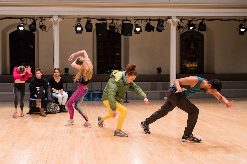  Sterling Hyltin shields her eyes as Sara Mearns, Jodie Melnick and Rashaun Mitchen dance on a diagonal wearing haphazard colorful clothes
